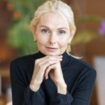 front-view-alluring-older-business-woman-posing